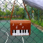 Load image into Gallery viewer, Piano Keys Music Note Shoulder Bag
