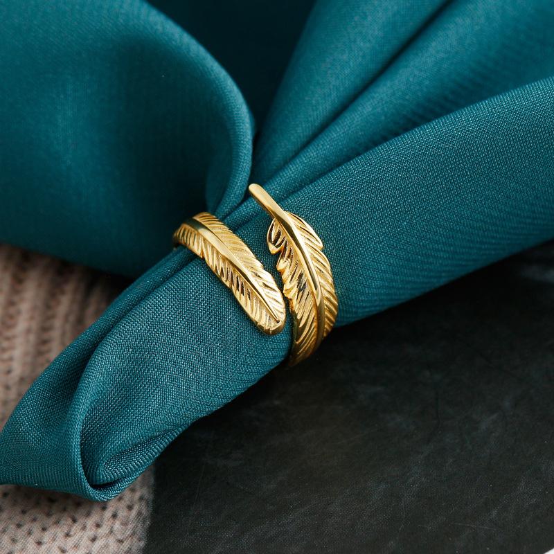 Adjustable Golden Plume Ring