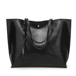 Load image into Gallery viewer, Fashionable Tasseled Shoulder Bag
