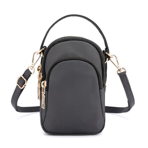 Small colored shoulder bag for women