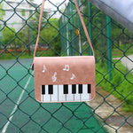 Load image into Gallery viewer, Piano Keys Music Note Shoulder Bag
